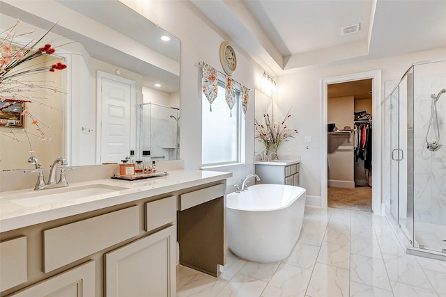 21123 Coral View Dr, Cypress, TX 77433 - bathroom with a stall shower, vanity, visible vents, and a freestanding bath