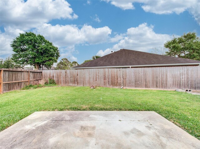 1311 Holly Lake Ct, Katy, TX 77450 - view of yard with a fenced backyard and a patio
