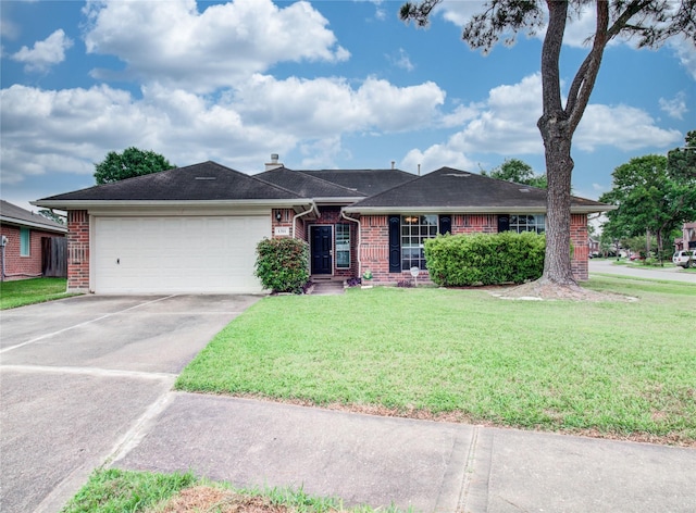 1311 Holly Lake Ct, Katy, TX 77450 - ranch-style home with concrete driveway, an attached garage, brick siding, and a front yard