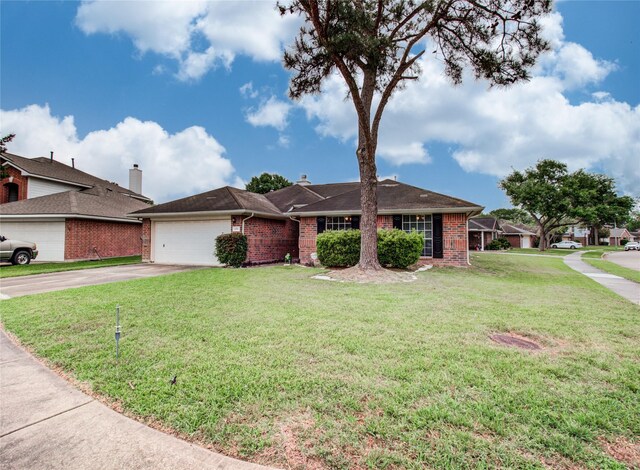 1311 Holly Lake Ct, Katy, TX 77450 - single story home with brick siding, an attached garage, driveway, and a front lawn