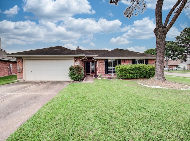 1311 Holly Lake Ct, Katy, TX 77450 - single story home with an attached garage, brick siding, driveway, and a front lawn