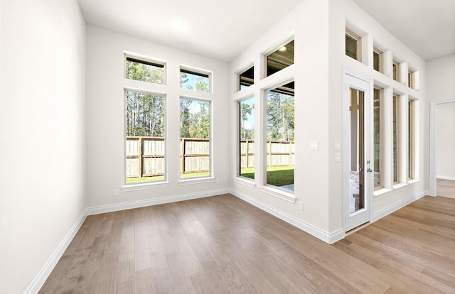 8215 Mount Washburn Ln, Porter, TX 77365 - doorway to outside with wood finished floors and baseboards