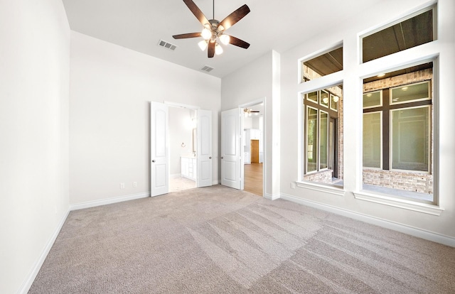 8215 Mount Washburn Ln, Porter, TX 77365 - unfurnished bedroom featuring baseboards, visible vents, and carpet floors