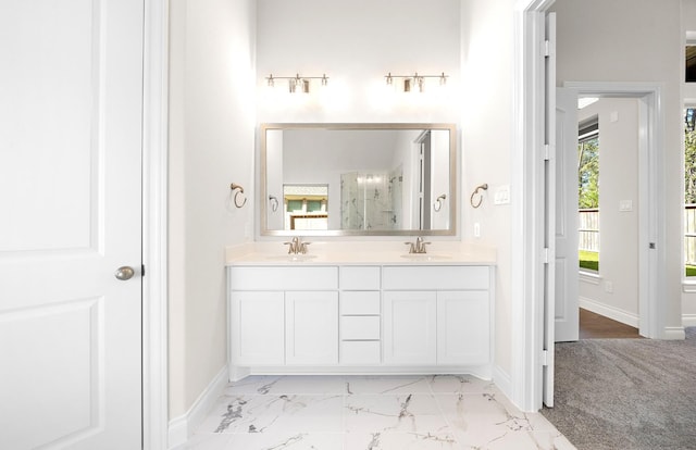 8215 Mount Washburn Ln, Porter, TX 77365 - full bath featuring marble finish floor, a sink, walk in shower, double vanity, and baseboards