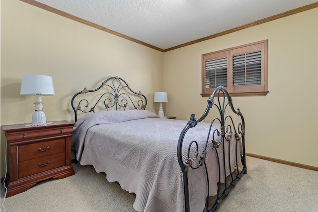 carpeted bedroom featuring baseboards, crown molding, and a textured ceiling