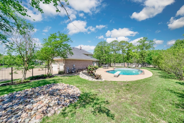 view of pool with a fenced in pool, a yard, a fenced backyard, and a diving board