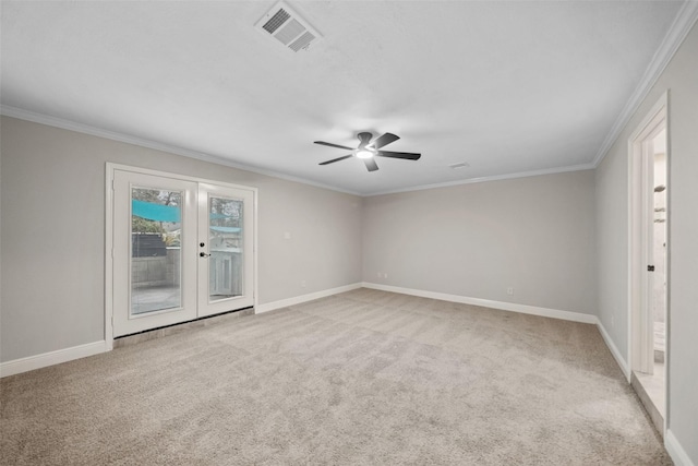unfurnished room featuring visible vents, baseboards, and light colored carpet