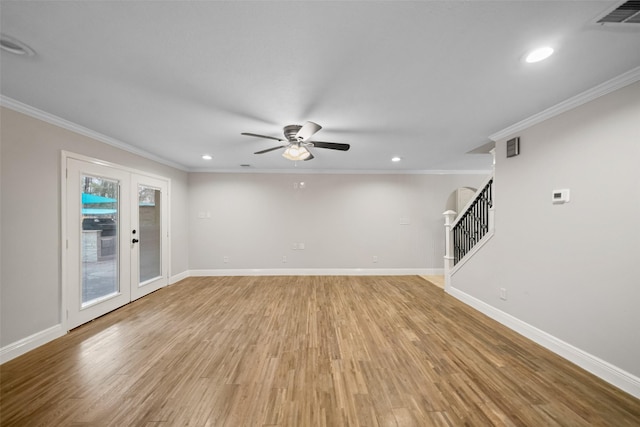 unfurnished living room with visible vents, ceiling fan, stairway, and recessed lighting