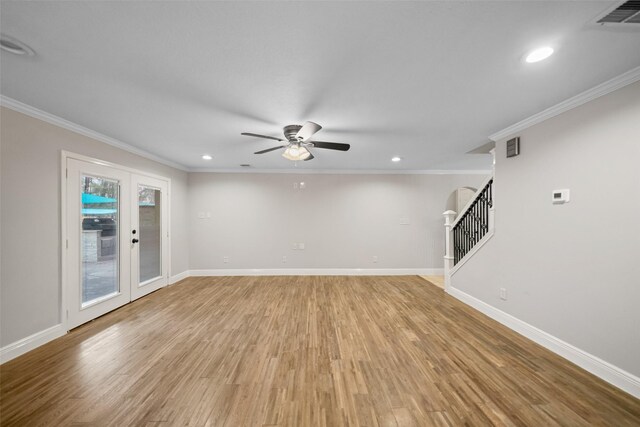 533 Rapidan Park, Conroe, TX 77302 - unfurnished living room with stairs, a ceiling fan, recessed lighting, light wood finished floors, and baseboards