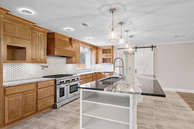 kitchen featuring premium range hood, a sink, open shelves, and double oven range
