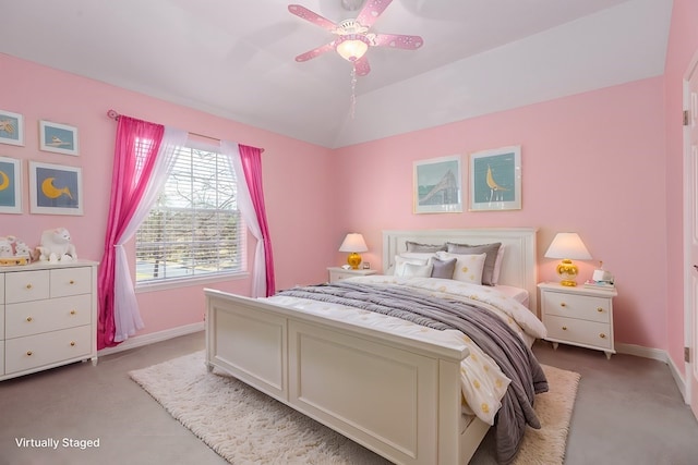carpeted bedroom featuring ceiling fan, baseboards, and lofted ceiling