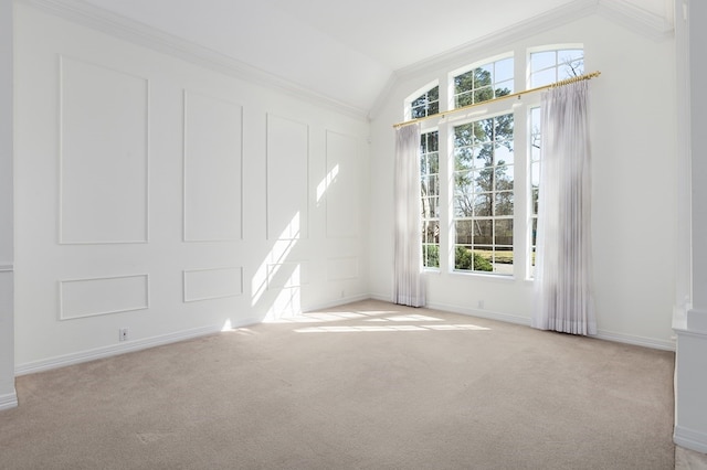 carpeted empty room featuring crown molding, baseboards, and lofted ceiling