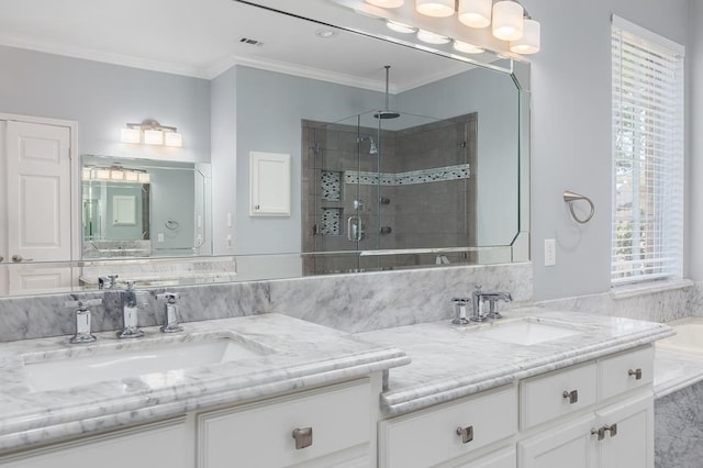 bathroom featuring a shower stall, crown molding, vanity, and visible vents