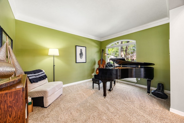 sitting room with carpet, crown molding, and baseboards