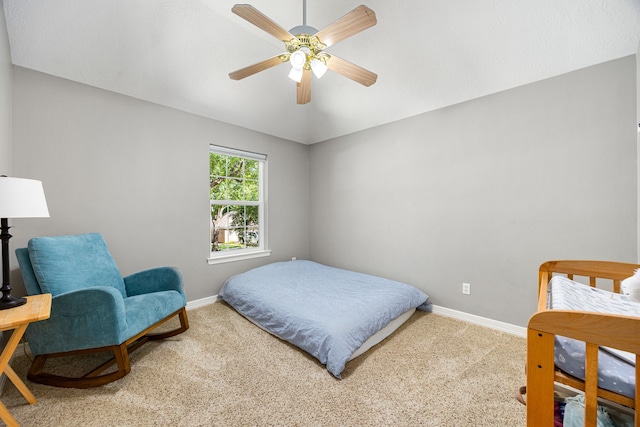 bedroom featuring a ceiling fan, baseboards, and carpet flooring
