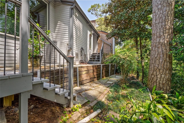 view of home's exterior with stairway