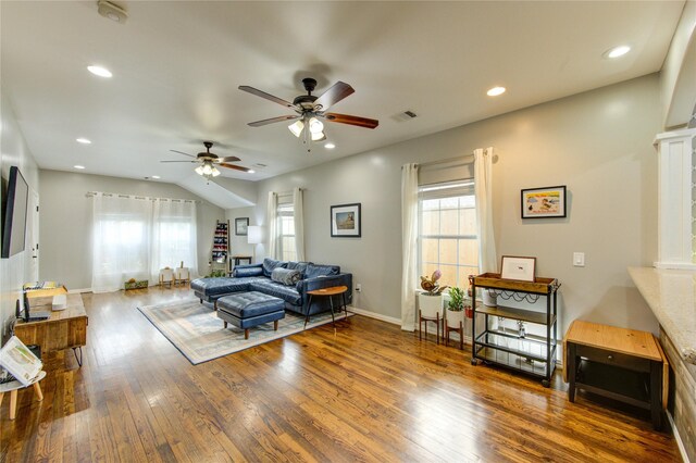 living room with ceiling fan, wood finished floors, recessed lighting, and baseboards