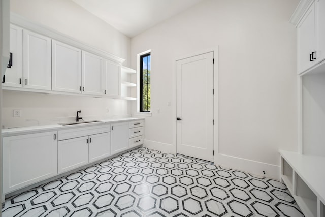 4458 Lily Bean, Montgomery, TX 77316 - washroom with baseboards and a sink