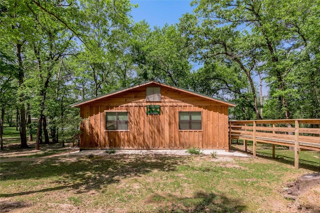 view of outdoor structure with fence