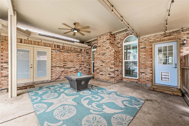 view of patio / terrace featuring french doors and ceiling fan