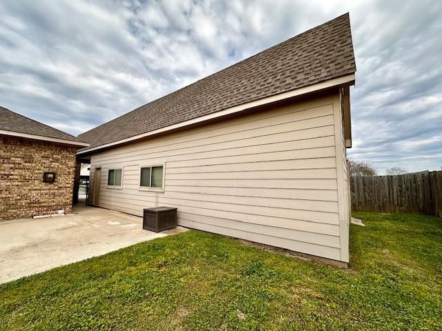 2407 Florence Dr, League City, TX 77573 - back of property featuring a patio area, fence, and a lawn