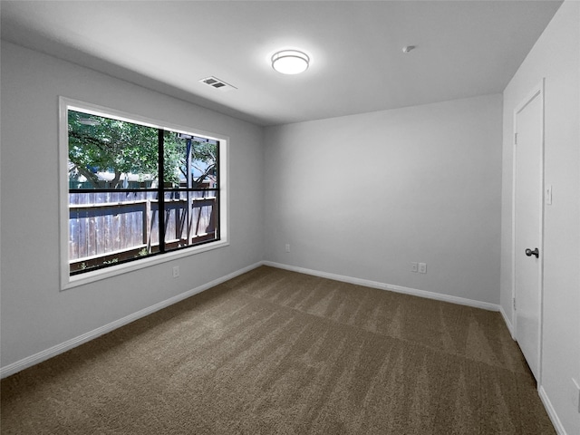 202 Essex Pl, Stafford, TX 77477 - carpeted empty room with visible vents and baseboards