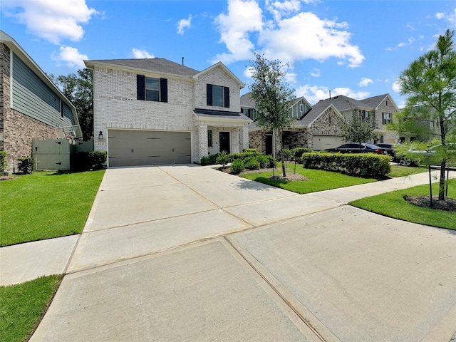 10716 Wild Chives, Conroe, TX 77385 - view of front of property featuring a garage, a front yard, brick siding, concrete driveway, and a residential view