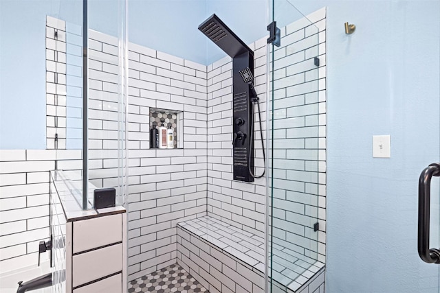 bathroom featuring a stall shower
