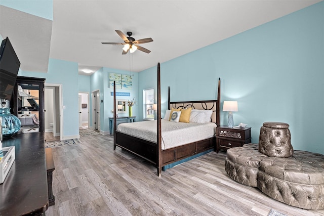 bedroom with wood finished floors and ceiling fan