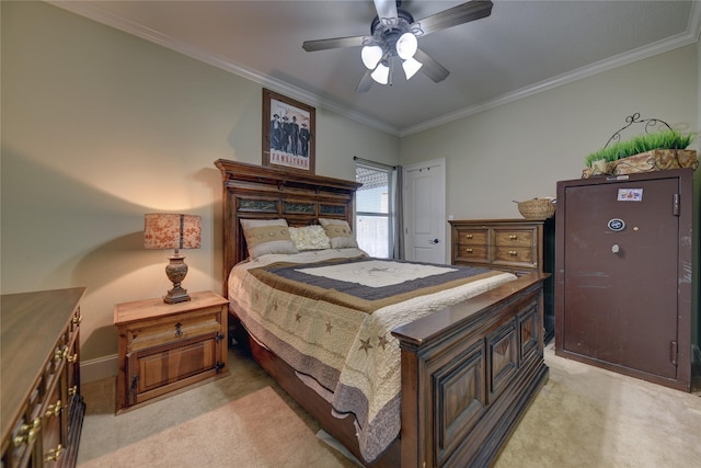 bedroom with a ceiling fan, light carpet, baseboards, and ornamental molding