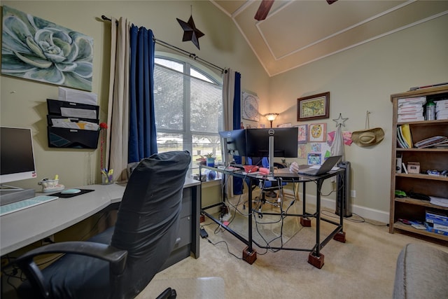 carpeted office space featuring baseboards and vaulted ceiling