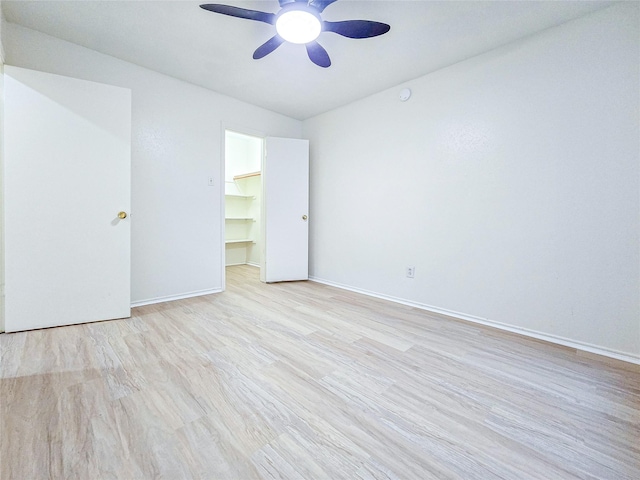 1531 Miller Ave, Katy, TX 77493 - spare room featuring baseboards, a ceiling fan, and wood finished floors