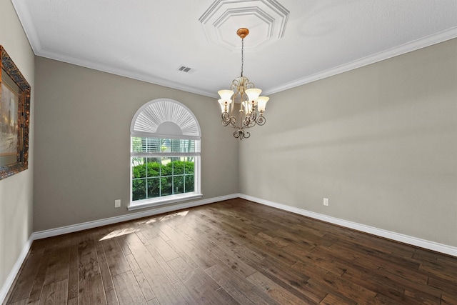 2023 Forest Garden Dr, Kingwood, TX 77345 - empty room featuring a chandelier, dark wood-style flooring, ornamental molding, and baseboards