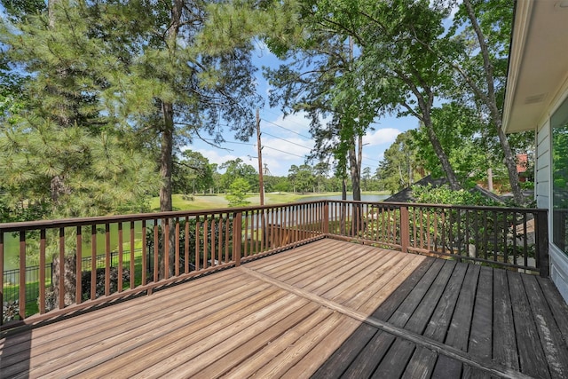 2023 Forest Garden Dr, Kingwood, TX 77345 - wooden deck featuring a water view and view of wooded area