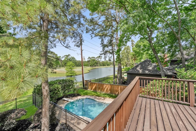 2023 Forest Garden Dr, Kingwood, TX 77345 - view of pool featuring a fenced backyard, a deck with water view, and view of wooded area