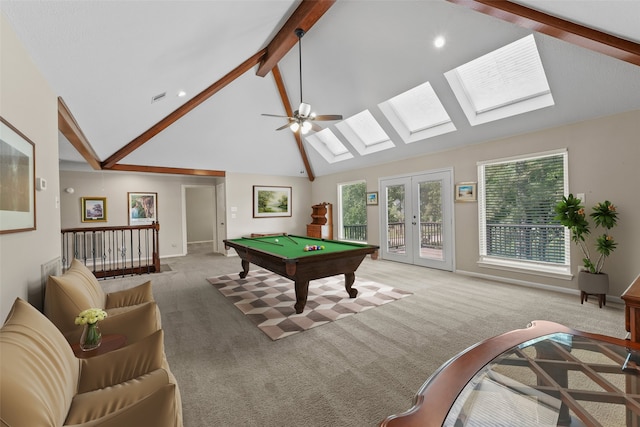 2023 Forest Garden Dr, Kingwood, TX 77345 - game room featuring light carpet, beamed ceiling, billiards, a skylight, and high vaulted ceiling