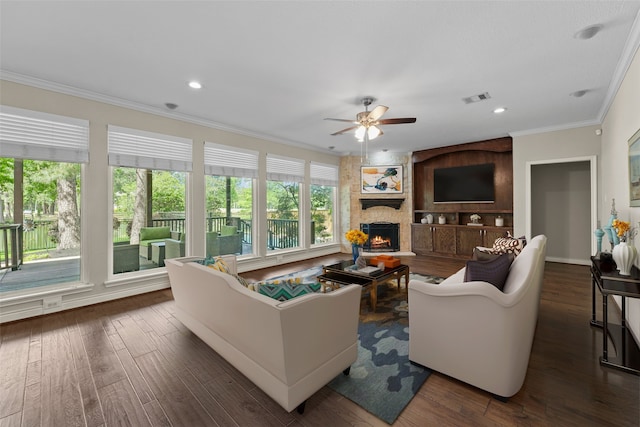 2023 Forest Garden Dr, Kingwood, TX 77345 - living area featuring ceiling fan, crown molding, wood finished floors, a fireplace, and recessed lighting