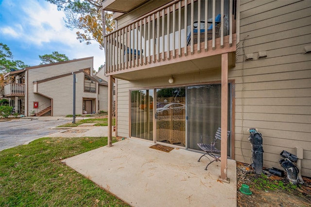 view of patio with a balcony