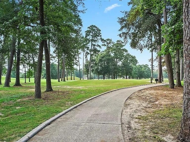 surrounding community featuring a lawn