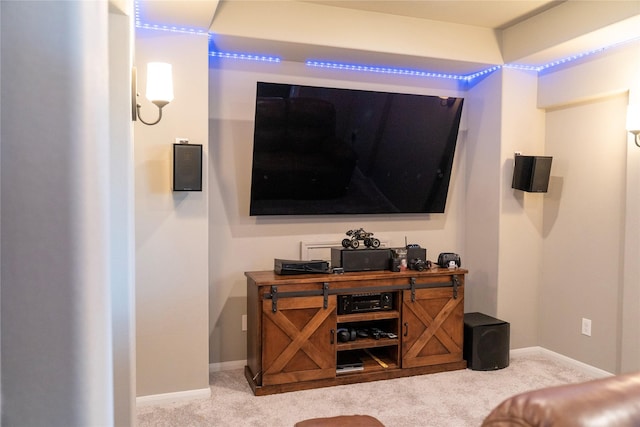 interior space with baseboards and carpet floors
