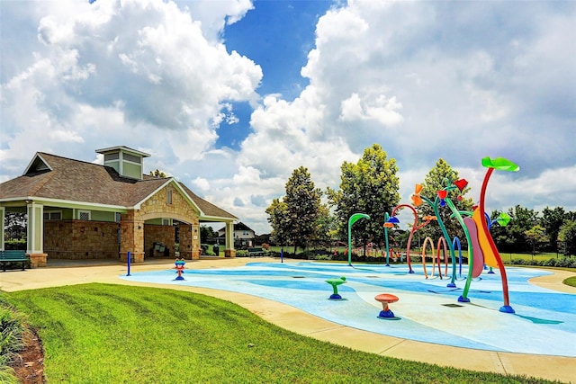 community play area with a yard