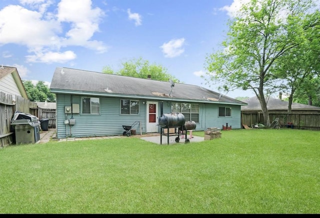 22223 Springgate Dr, Spring, TX 77373 - rear view of property with a lawn, heating fuel, a fenced backyard, and a patio area