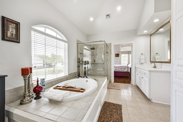 1301 Ketch Ct, League City, TX 77573 - ensuite bathroom featuring a shower stall, vaulted ceiling, recessed lighting, tile patterned floors, and a bath