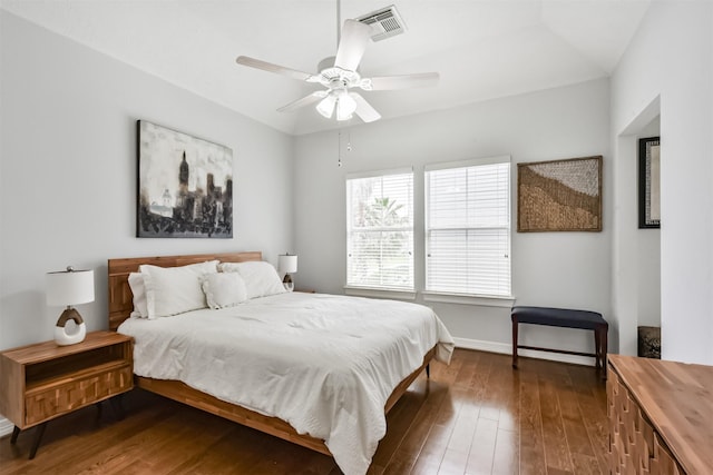 1301 Ketch Ct, League City, TX 77573 - bedroom featuring dark wood-style flooring, a ceiling fan, and baseboards
