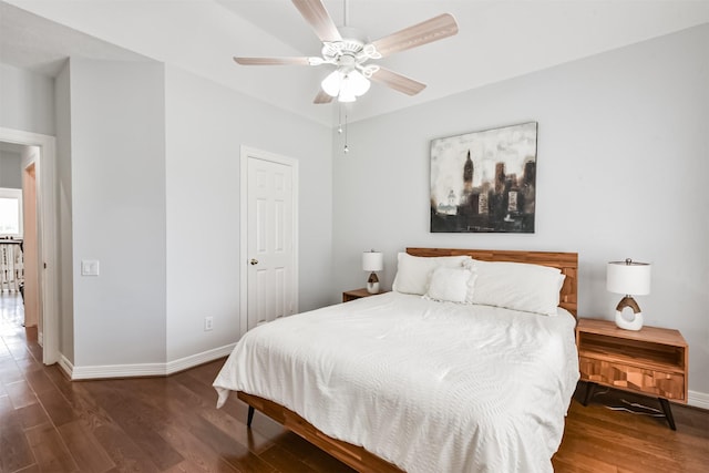 1301 Ketch Ct, League City, TX 77573 - bedroom with wood finished floors, baseboards, and a ceiling fan