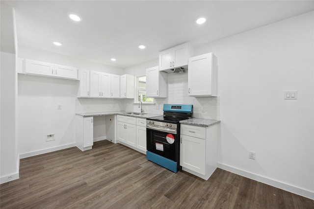 kitchen with white cabinets, stainless steel electric range oven, and a sink