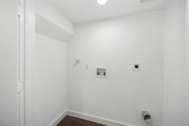 clothes washing area with laundry area, hookup for a washing machine, hookup for an electric dryer, hookup for a gas dryer, and baseboards