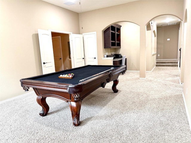 34315 E Short Leaf Pine Ct, Pinehurst, TX 77362 - game room with arched walkways, light carpet, billiards, and baseboards