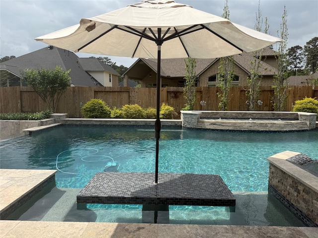 34315 E Short Leaf Pine Ct, Pinehurst, TX 77362 - view of pool featuring a pool with connected hot tub and fence