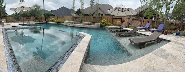 34315 E Short Leaf Pine Ct, Pinehurst, TX 77362 - view of swimming pool featuring a patio area, a pool with connected hot tub, a residential view, and a fenced backyard